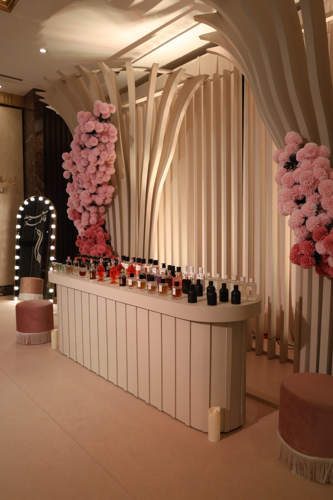Floral arch and favours bar styled by Diamond Events at Beach Rotana